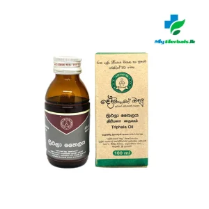 A bottle of Desinghage Thriphala Oil 100ml, an Ayurvedic therapeutic oil for Tridoshic balance, scalp toning, and skin purification. Shop Now at www.myherbals.lk