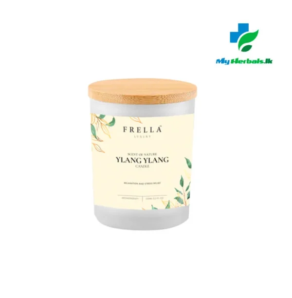 A lit Frella Aromatherapy Candle with Ylang Ylang Essential Oil, made with beeswax to soothe and calm.